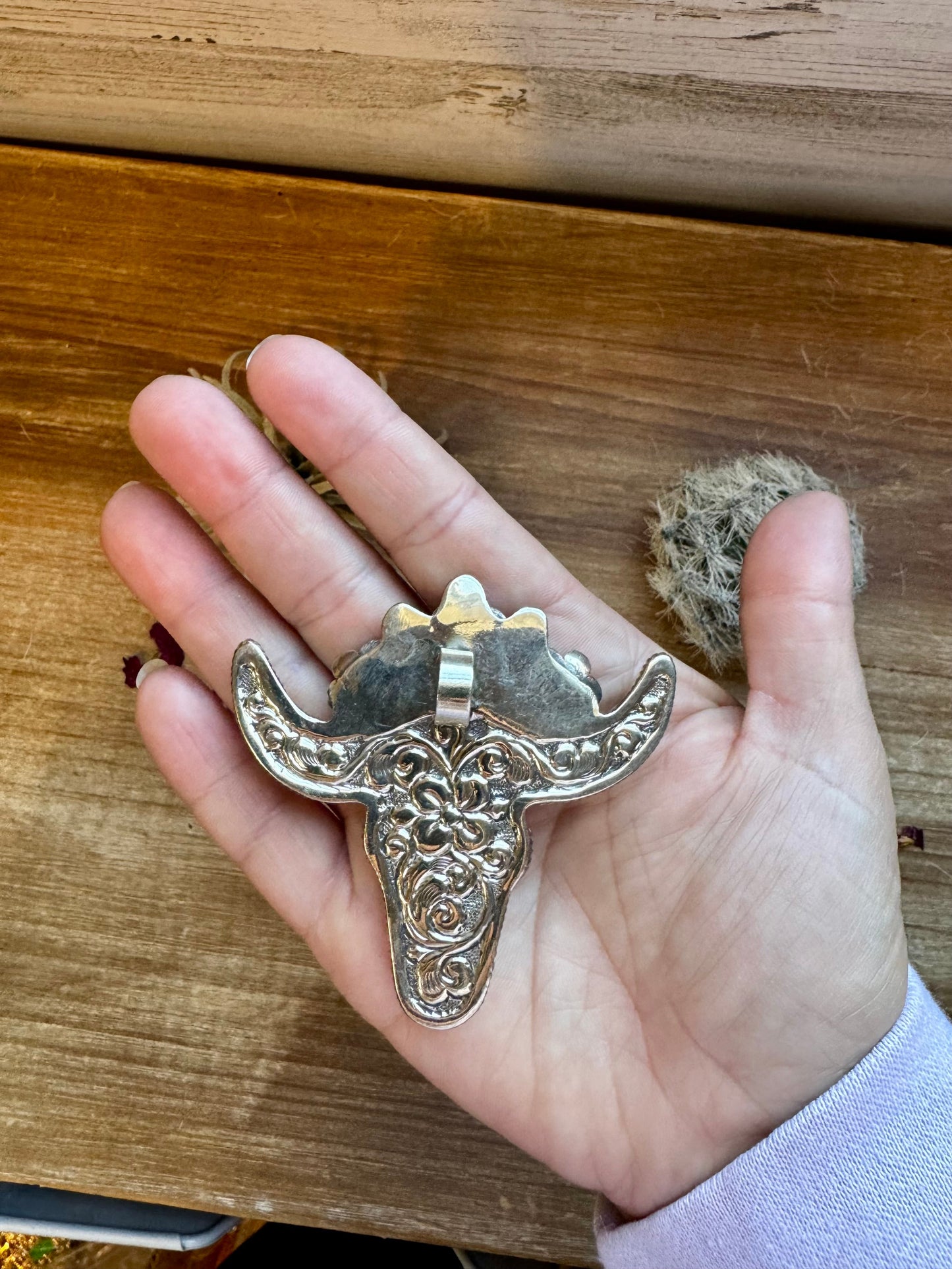 Big Antler longhorn with turquoise pendant with color flowers