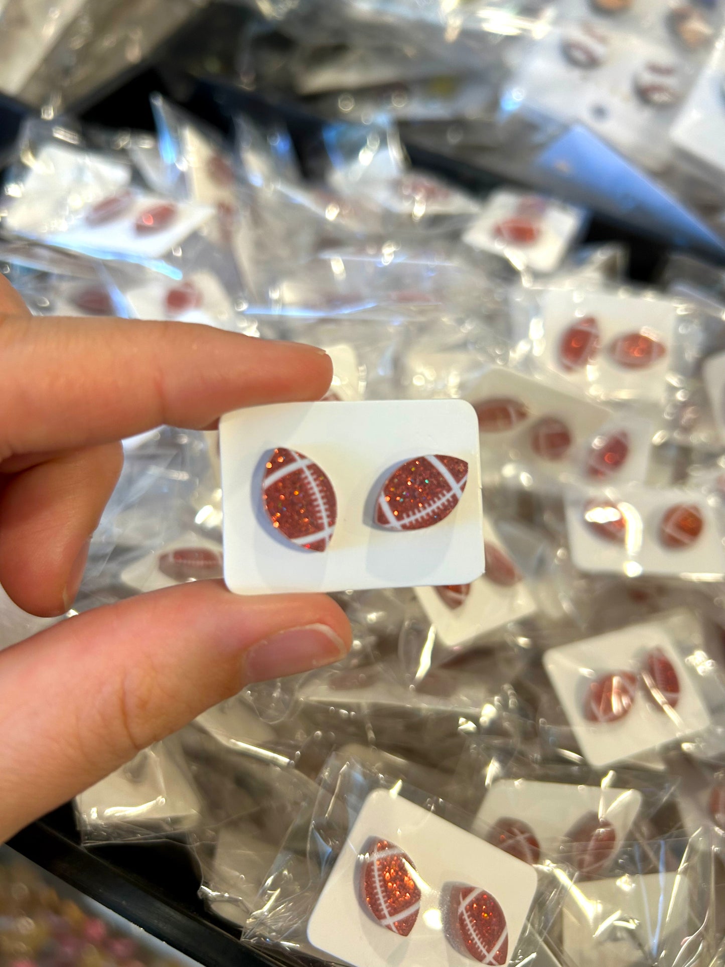 π99 Cent Football Stud Earrings