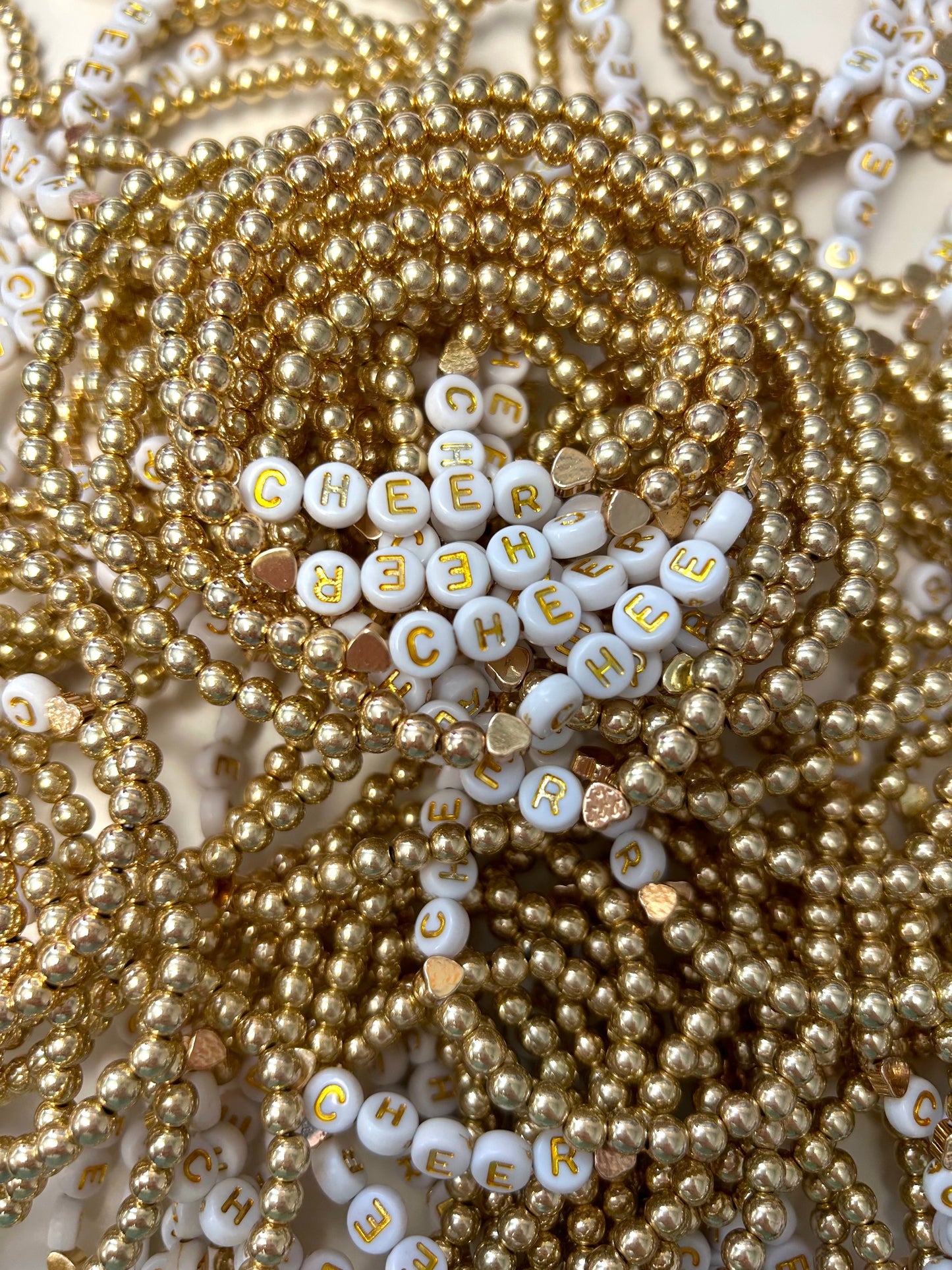 ๐ฃ Gold CHEER Bracelets