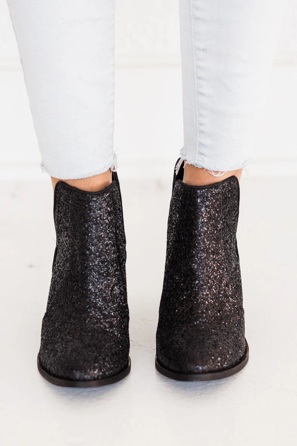 Fiera Glitter Booties in Black by Not Rated