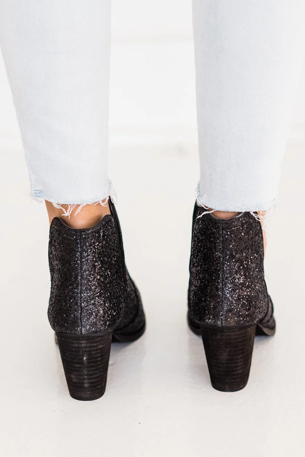 Fiera Glitter Booties in Black by Not Rated